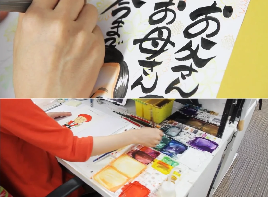 水彩絵の具で似顔絵を手描きしている制作風景